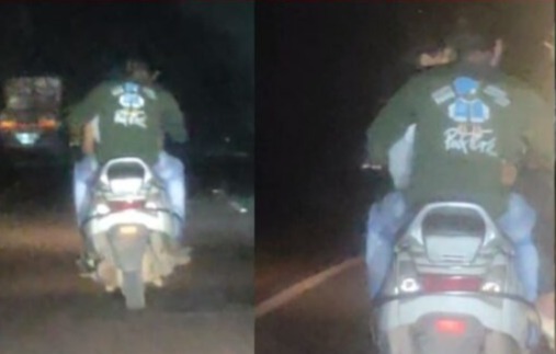 Couple Romance Video: चलती स्कूटी पर रोमांस करता कपल का वीडियो वायरल, लोगों में आक्रोश...